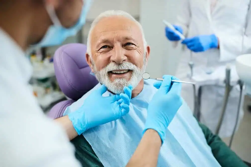 A senior man at a dental appointment